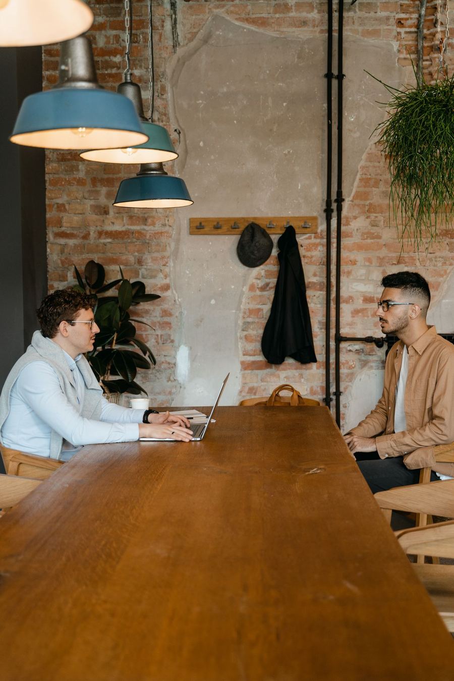 Two people in a quiet, discreet conversation